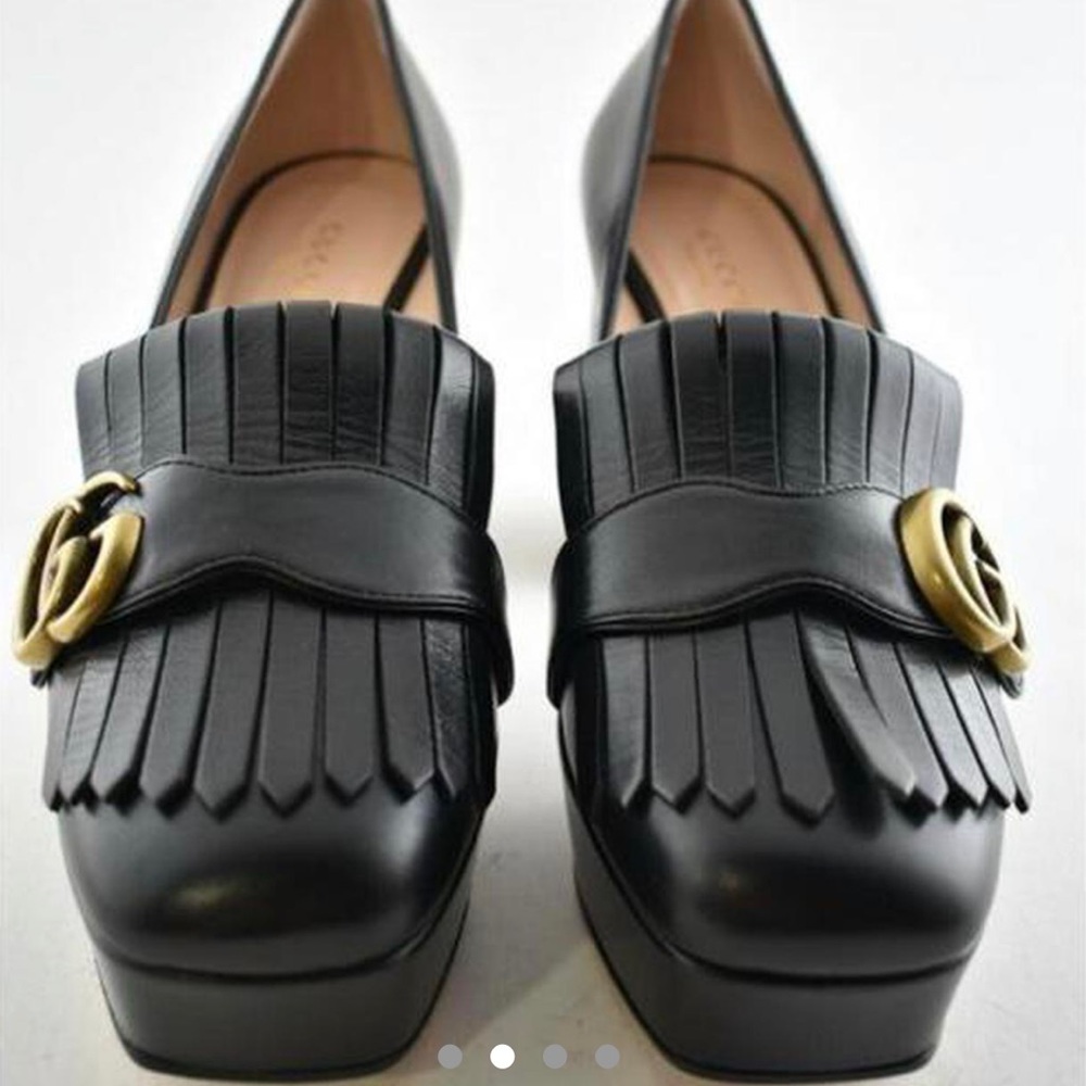 platform fringe loafers from Gucci featuring a round toe and interlocking GG